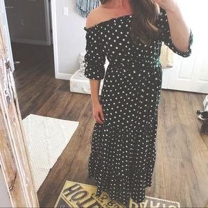A polka dot hunter green dress